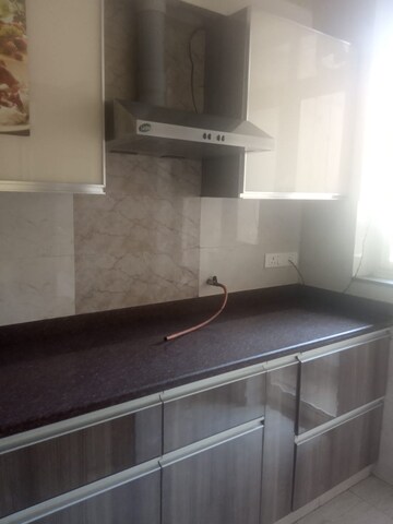 Kitchen in 2 BHK Apartment at Unitech Woodstock Floors, Sector 50 – for Rent