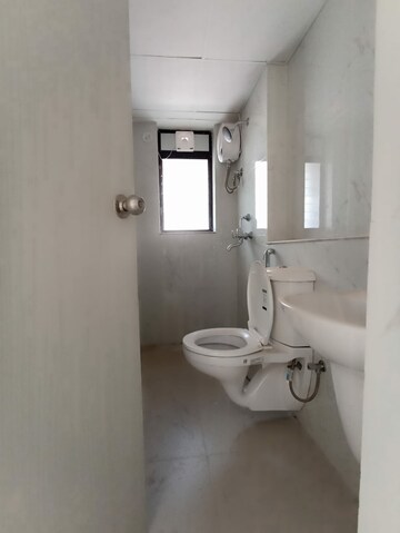Bathroom in 1 BHK Apartment at Runwal Gardens, Dombivli East – for Rent