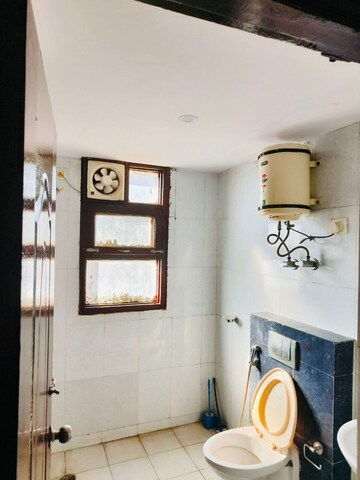 Bathroom in 4 BHK Apartment at Urja Towers, Sector 47 – for Rent