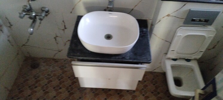 Bathroom, jaypee-greens-kosmos 2 Bedroom 950 Sq.Ft. Apartment In Sector 134 Noida 8171774