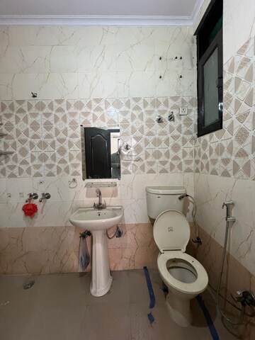 Bathroom in 4 BHK Builder Floor at Pratap Vihar – for Sale