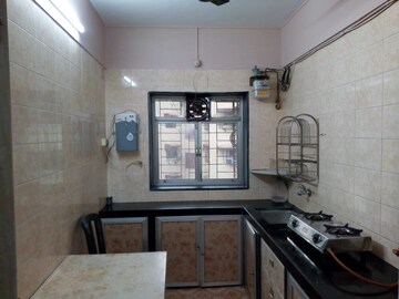 Kitchen in 1 BHK Apartment at Nav Monica Society, Santacruz East – for Rent