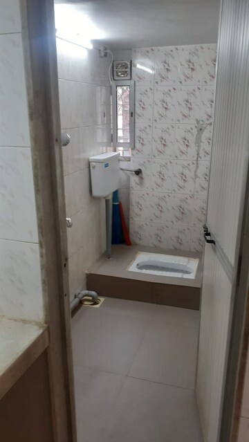 Bathroom in 1 BHK Apartment at Viman Darshan CHS, Andheri East – for Rent