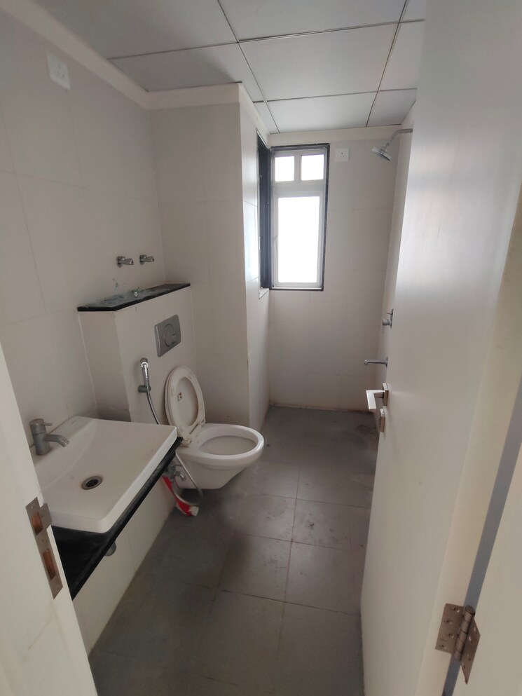 Bathroom, godrej-greens 2 Bedroom 563 Sq.Ft. Apartment In Undri Pune 8172032