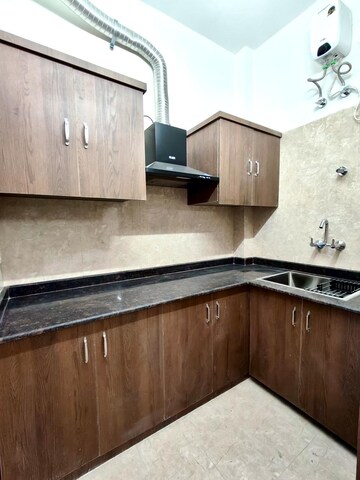 Kitchen in 3 BHK Apartment at Ansal API Esencia, Sector 67 – for Rent