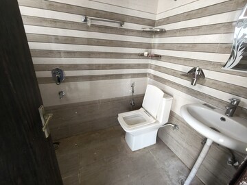 Bathroom in 3 BHK Apartment at Ansal API Esencia, Sector 67 – for Rent