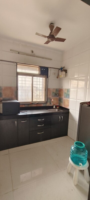 Kitchen in 1 BHK Apartment at Sky View CHS, Kurla – for Sale