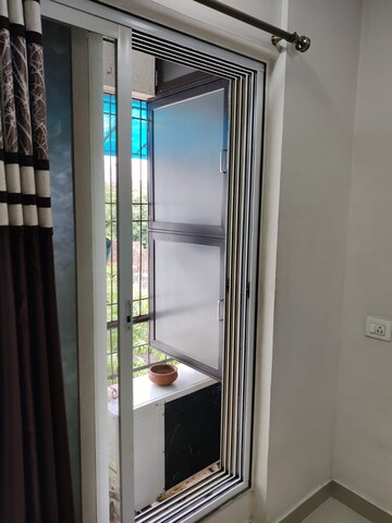 Building Lobby in 2 BHK Apartment at Sahyadri Shruberry, Moshi – for Rent
