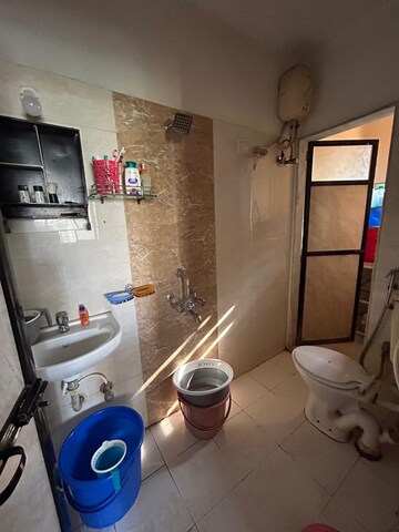 Bathroom in 2 BHK Apartment at Swaraj CHS Moshi, Moshi – for Sale