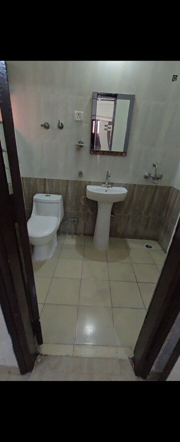 Bathroom in 2 BHK Apartment at Sangwan Heights, Raj Nagar Extension – for Rent