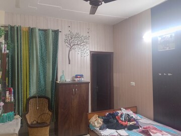 Bedroom in 2 BHK Builder Floor at Dhakoli Village – for Sale