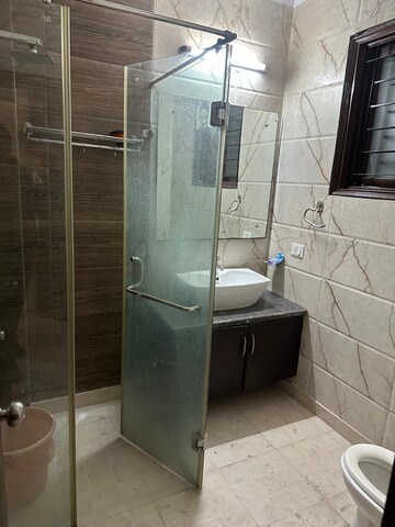 Bathroom in 3 BHK Apartment at Gardenia Golf City, Sector 75 – for Sale