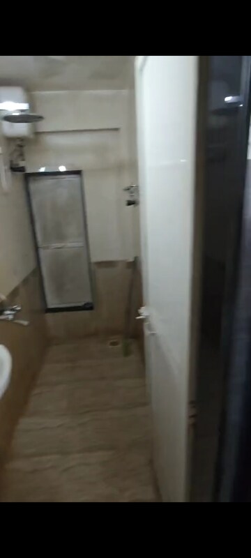 Bathroom in 1 BHK Apartment at Welfare CHS, Andheri West – for Rent