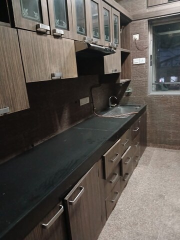 Kitchen in 2 BHK Apartment at Kalpa Taru Siddhachal V, Kasarvadavali – for Sale