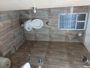 Bathroom in 2 BHK Apartment at Realty7 Wonderwall, Balewadi – for Rent