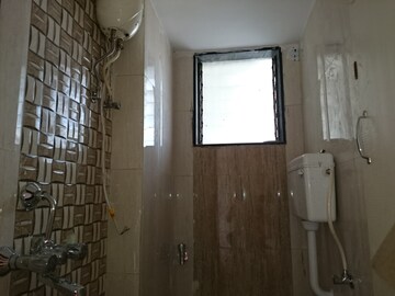 Bathroom in 2 BHK Apartment at Ostwal Avenue, Mira Road – for Sale