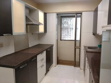 Kitchen in 3 BHK Apartment at Ekta Heritage Apartment, Khar West – for Sale