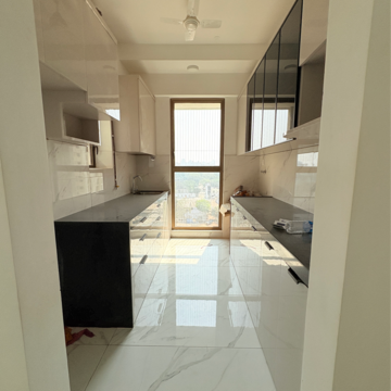 Kitchen in 2 BHK Apartment at Raymond Ten X Habitat, Swastik Garden – for Rent
