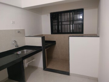 Kitchen in 2 BHK Apartment at Kohinoor Viva City, Dhanori – for Rent