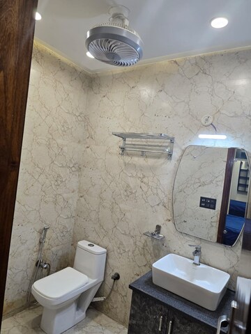 Bathroom in 4 BHK Builder Floor at Niti Khand – for Sale