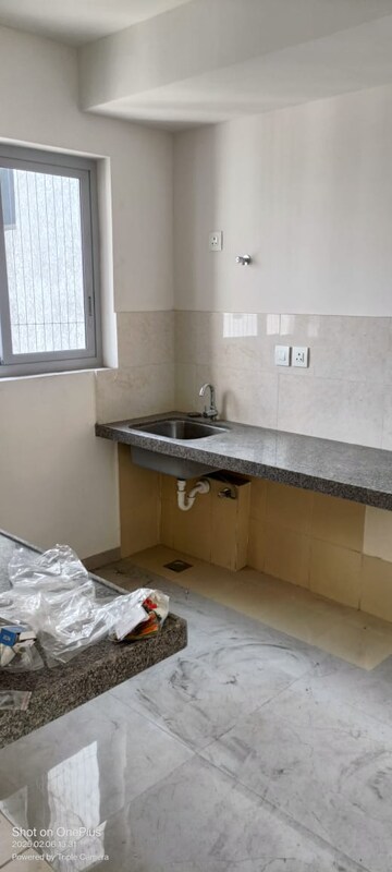 Kitchen in 3 BHK Apartment at Piramal Vaikunth, Balkum Pada – for Rent
