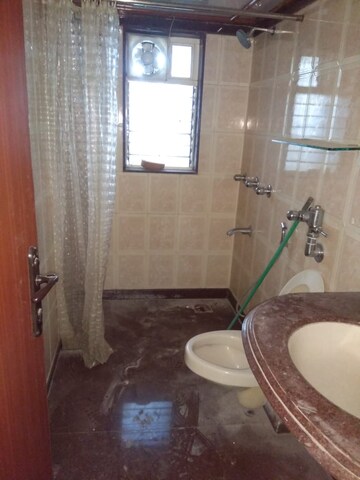 Bathroom in 3 BHK Apartment at Satyam Building Khar, Khar West – for Rent