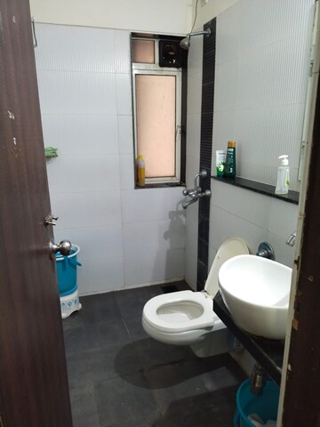 Bathroom in 1 BHK Apartment at Raunak Heights, Ghodbunder Road – for Rent
