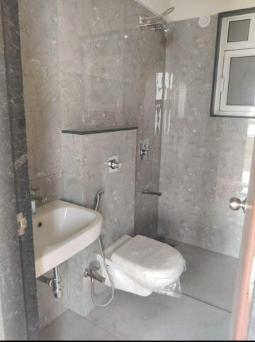 Bathroom in 3 BHK Apartment at Kohinoor Viva City, Dhanori – for Rent