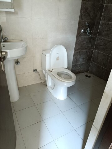 Bathroom in 2 BHK Apartment at JKG Palm Resort, Raj Nagar Extension – for Rent