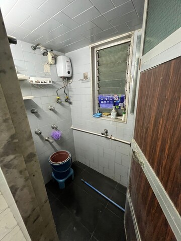 Bathroom in 1 BHK Apartment at Sundar Nagar CHS, Malad West – for Rent