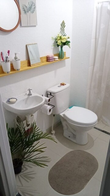 Bathroom in 4 BHK Builder Floor at Mansarover Garden – for Sale