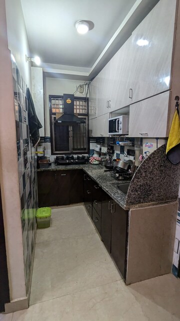 Kitchen in 4 BHK Builder Floor at Mansarover Garden – for Sale