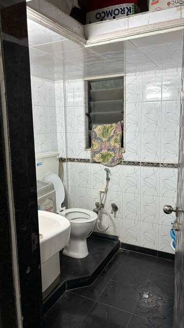 Bathroom in 2 BHK Apartment at United Unity Heights, Malad West – for Rent