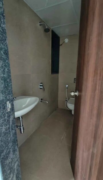 Bathroom in 2 BHK Apartment at Runwal Eirene, Balkum Pada – for Rent
