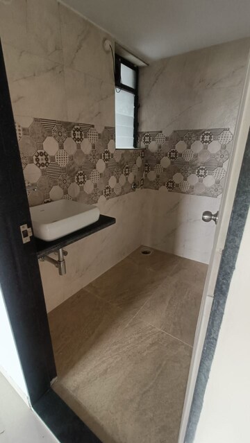 Bathroom in 1 BHK Apartment at Sanghvi Eco City Phase 3, Mira Road East – for Rent