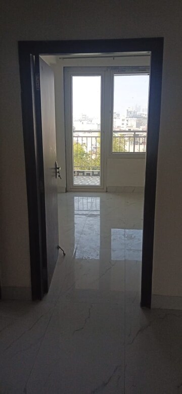 Building Lobby in 2 BHK Apartment at Unitech Uniworld Gardens 2, Sector 47 – for Rent