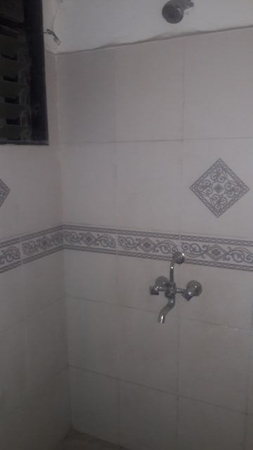 Bathroom in 1.5 BHK Apartment at Mantri Park, Goregaon East – for Rent