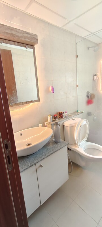 Bathroom in 3 BHK Apartment at Bhartiya City Nikoo Homes II, Thanisandra Main Road – for Rent