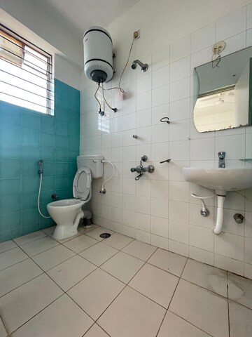 Bathroom in 3 BHK Apartment at Samhita Spice Wood, Cv Raman Nagar – for Rent