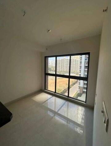 Living Room in 1 BHK Apartment at Lodha Crown Quality Homes, Majiwada – for Rent