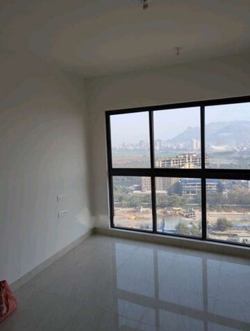 Living Room in 2 BHK Apartment at Lodha Crown Quality Homes, Majiwada – for Rent