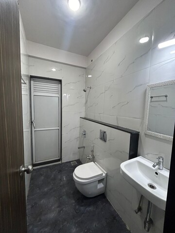 Bathroom in 2 BHK Apartment at Gala Pride Palms, Kolshet Road – for Rent