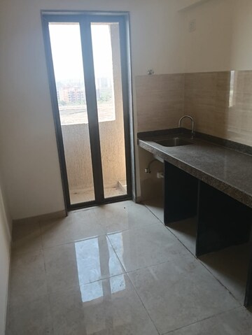 Kitchen in 2 BHK Apartment at Sunteck Maxxworld 4, Naigaon East – for Rent