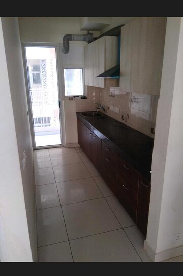 Kitchen in 2 BHK Apartment at Windlass River Valley, Harrawala – for Sale