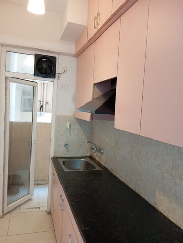 Kitchen in 2 BHK Apartment at Signature Global The Millennia, Sector 37d – for Rent