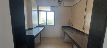 Kitchen in 2 BHK Apartment at Hiranandani Estate, Ghodbunder Road – for Sale