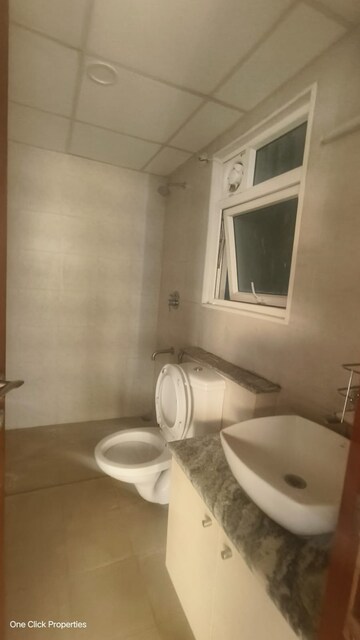 Bathroom in 2 BHK Apartment at Bhartiya Nikoo Homes, Thanisandra Main Road – for Rent