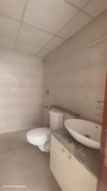 Bathroom in 2 BHK Apartment at Bhartiya Nikoo Homes, Thanisandra Main Road – for Rent