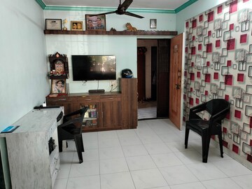 Living Room in 1 BHK Apartment at Brahmand CHS, Brahmand – for Sale