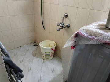 Bathroom in 1 BHK Apartment at Brahmand CHS, Brahmand – for Sale